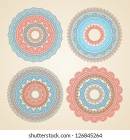 Ornamental round lace pattern. Set of four colorful ornament