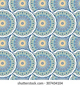 Ornamental seamless pattern, background with many details. Ethnic traditional ornament. Vector illustration in beige and blue pastel colors.