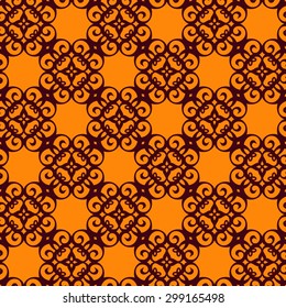 Ornamental seamless pattern in dark brown on yellow. Abstract background