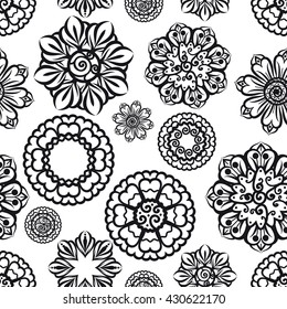 Ornamental seamless pattern with ethnic floral elements. Vector illustration