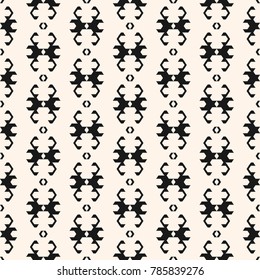Ornamental seamless pattern in ethnic style. Vector black and white tribal ornament with simple geometric shapes. Abstract traditional background. Folk texture. Design for textile, prints, furniture