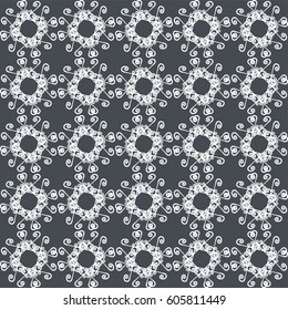 Ornamental seamless pattern. Gray and white colors. Endless template for wallpaper, textile, wrapping, print, interior, floor, fabric. Abstract texture. Traditional ethnic ornament for  design.  