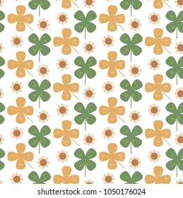 Ornamental seamless pattern with leaf and flowers. Cute print in scandinavian style.The image is made in the style of spring things. Abstract background. Ornamental, traditional, simple.