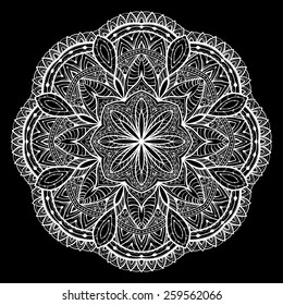 Ornamental, White, lace, vector mandala on a black background.