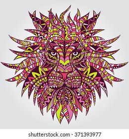 Ornamented colored head of the lion isolated. African / indian / totem / tattoo design. Detailed Lion in aztec style. It may be used for design of a t-shirt, bag, postcard, a poster and so on.