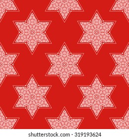 Ornamented seamless pattern. White lacy 6-angled stars on red background