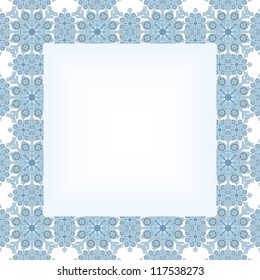 Ornate christmas frame with borders from snowflakes.