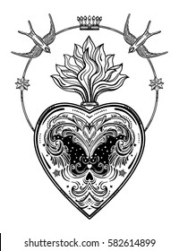 Ornate decorative heart with flame. Vintage gothic style inspired art. Vector illustration isolated. Tattoo design, trendy romance symbol for your use.

