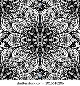 Ornate, eastern mandala with colored contour. Art, round, colorful ornament on a black, white and gray colors.