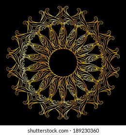 Ornate element in gold colors over black