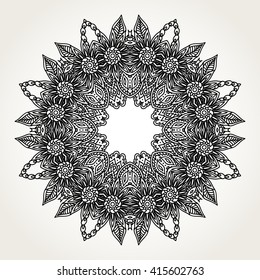 Ornate lacy doodle floral round rosette in black over white backgrounds. Hand drawn mandala. Coloring pages for adults.