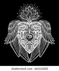 Ornate mystic eye inside the the decorative heart,with wings. Vintage alchemy and gothic style inspired art. Vector illustration isolated. Tattoo design, trendy romance symbol for your use.

