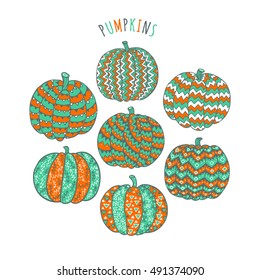 Ornate pumpkin collection. Set of gourds with hand-drawn geometric ornaments. Decorative elements for t-shirt prints, posters, greeting cards, invitations, halloween decoration. EPS 10 vector Isolated