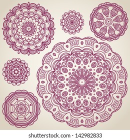 Ornate round ornaments in rustic style. Elements for design. It can be used for decorating of invitations, cards, decoration for bags and clothes.