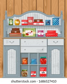 ornate vintage cupboard with cute tin boxes and canned goods on shelves against wooden panels for your design