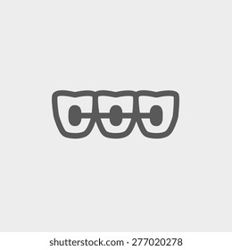 Orthodontic braces icon thin line for web and mobile, modern minimalistic flat design. Vector dark grey icon on light grey background.