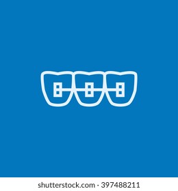 Orthodontic braces line icon.