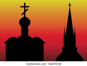 Orthodox and Catholic churches on the sunset background