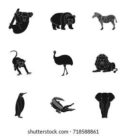 Ostrich emu, crocodile, giraffe, tiger, penguin and other wild animals. Artiodactyla, mammalian predators and animals set collection icons in black style vector symbol stock illustration web.