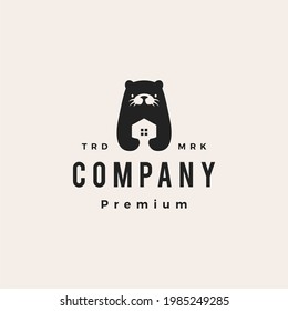 otter house home hipster vintage logo vector icon illustration