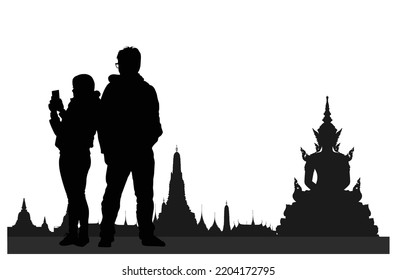 ouple of lovers make a selfie with Buddhist temple in background