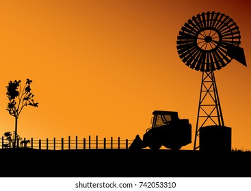 Outback Australia silhouette scene of farm house and windmill