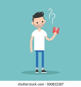 Outdated technology concept. Young bearded man has no idea what to do with the floppy disk / flat editable vector illustration