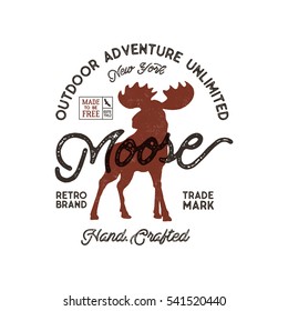 Outdoor adventure label. Vintage typography with moose and texts. Retro illustration. Vector wilderness logo, emblem with letterpress effect. Custom explorer quote