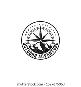 Outdoor adventure logo with mountain elements and wind rose