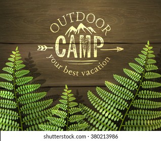 'Outdoor camp, your best vacation' sign with green fern leafs on wooden background. Realistic vector illustration.