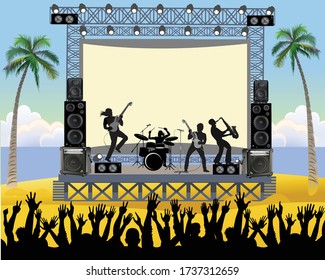 Outdoor concert stage on the beach. Outdoor summer festival concert with pop music band playing music outdoor on stage
