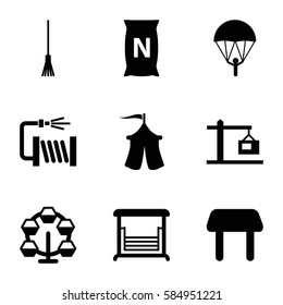 outdoor icons set. Set of 9 outdoor filled icons such as table, rake, water hose, swing, bag with ground, tent, construction  crane, parachute