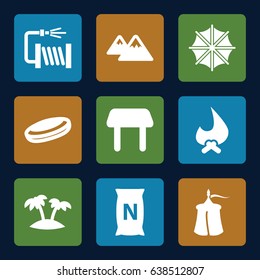 Outdoor icons set. set of 9 outdoor filled icons such as table, water hose, bag with ground, palm, mountain, umbrella, tent, hockey puck