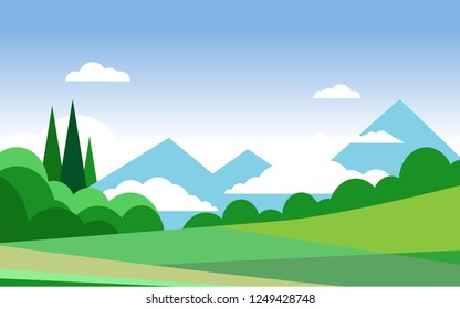 Outdoor landscape natural view of green grass field in summer time with background of mountain range