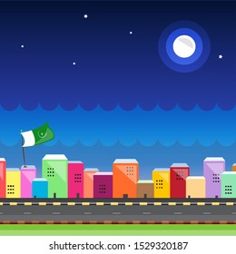 An outdoor Pakistan zindabad city landscape at night with full moon and bright colorful roadside apartments with Pakistani flag on rooftop of buildings with background of dusky sky with scallop edges.