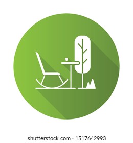 Outdoor space green flat design long shadow glyph icon. Rocking chair with table in garden. Patio furniture. Terrace outdoor furnishing for outside relax and leisure. Vector silhouette illustration