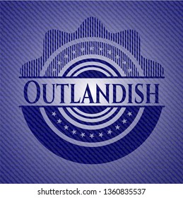 Outlandish badge with denim background