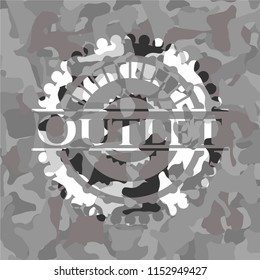 Outlet on grey camouflaged texture