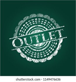 Outlet written on a chalkboard