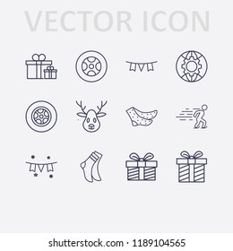 Outline 12 winter icon set. globe setting, tire, deer, sock, ice skating, gift, garland and garlands vector illustration