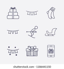 Outline 9 winter icon set. sock, gift, garland, garlands, smartphone gift, skiing and sleigh vector illustration