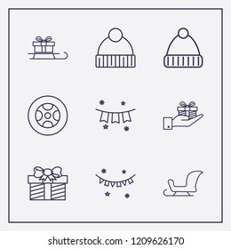 Outline 9 winter icon set. hand with gift box, sleigh, tire and gift vector illustration