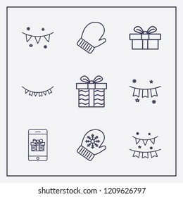 Outline 9 winter icon set. gift, winter glove, garland and garlands vector illustration