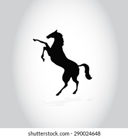 outline black a rearing horse on a gray background. a graphic drawing of a horse