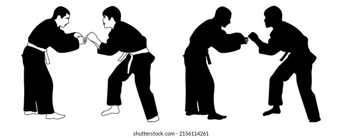 The outline of the black silhouette of a judoka athlete in a duel, fight. Judo sport, martial art.