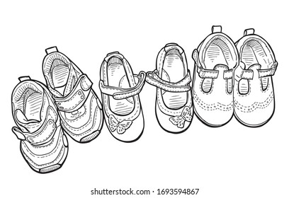 Outline drawings of top view of set shoes for little children