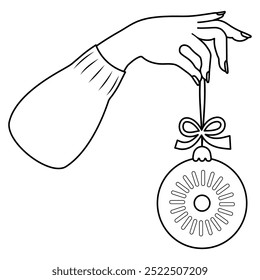 Outline elegant female hand with Christmas ball. Vector illustration. Holiday Xmas, New Year. Line drawing, coloring book. Vector illustration