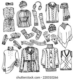 Outline Fashionable female knitted  clothing and accessories set on Sketchy style.W Autumn ,winter woman wear.Fashion illustrations.Vector.