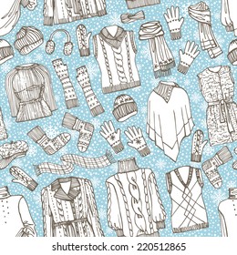 Outline Fashionable female knitted  clothing ,accessories seamless pattern on Sketchy style.Snowflakes background. Autumn ,winter woman wear.For fabric,background,backdrop,Wallpaper.Fashion Vector.