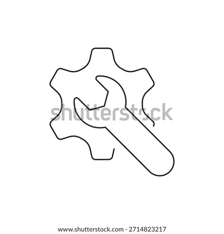 Outline illustration of a gear wheel with a spanner or wrench tool.